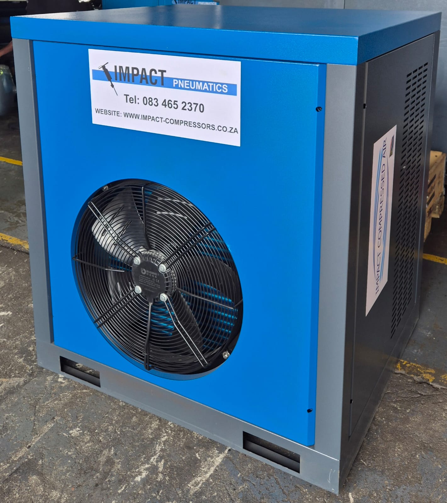 Impact Pneumatics compressor in workshop